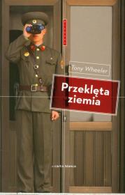 Przeklęta ziemia. Autor: Wheeler Tony. Dadada.pl Okładka książki Przeklęta ziemia