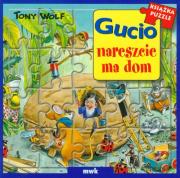 Gucio nareszcie ma dom. Autor: Wolf Tony. Dadada.pl Okładka książki Gucio nareszcie ma dom