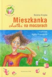 Mieszkanka chatki na moczarach. Autor: Kropka Bożena. Dadada.pl Okładka książki Mieszkanka chatki na moczarach