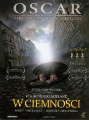 W ciemności z płytą DVD. Autor: Holland Agnieszka. Dadada.pl Okładka książki W ciemności z płytą DVD