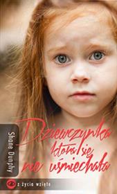 Dziewczynka, która się nie uśmiechała. Autor: Shane Dunphy. Dadada.pl Okładka książki Dziewczynka, która się nie uśmiechała