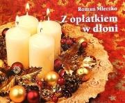 Z opłatkiem w dłoni. Perełka 29. Autor: Roman Mleczko. Dadada.pl Okładka książki Z opłatkiem w dłoni. Perełka 29