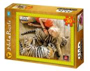 Okładka książki Puzzle Nela małą reporterka Tygrys