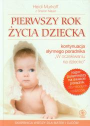 Pierwszy rok życia dziecka TW REBIS. Autor: Sharon Mazel, Heidi Murkoff. Dadada.pl Okładka książki Pierwszy rok życia dziecka TW REBIS