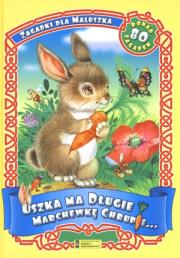 Okładka książki Uszka ma długie i marchewkę chrupie... Zagadki