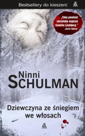 Dziewczyna ze śniegiem we włosach. Autor: Schulman Nina. Dadada.pl Okładka książki Dziewczyna ze śniegiem we włosach