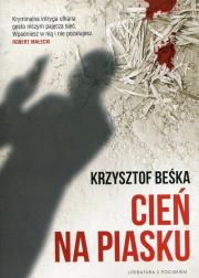 Cień na piasku. Autor: Krzysztof Beśka. Dadada.pl Okładka książki Cień na piasku