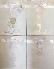 Torebka ozdobna z kokardą Komunia. Wydawca: Panorama. Dadada.pl Opakowanie Torebka ozdobna z kokardą Komunia