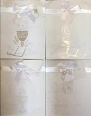 Torebka ozdobna z kokardą Komunia. Wydawca: Panorama. Dadada.pl Opakowanie Torebka ozdobna z kokardą Komunia