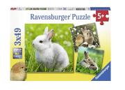 Puzzle 3x49 Delikatne króliczki. Wydawca: Ravensburger. Dadada.pl Opakowanie Puzzle 3x49 Delikatne króliczki
