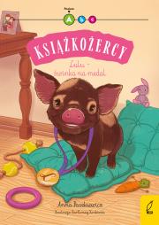 Lulu - świnka na medal. Książkożercy. Poziom A. Autor: Paszkiewicz Anna. Dadada.pl Okładka książki Lulu - świnka na medal. Książkożercy. Poziom A