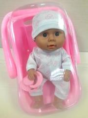 Lalka bobas w nosidełku. Wydawca: TOYS Paweł Wojda. Dadada.pl Opakowanie Lalka bobas w nosidełku