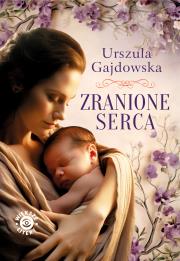 Zranione serca. Autor: Gajdowska Urszula. Dadada.pl Okładka książki Zranione serca
