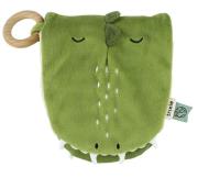 Książeczka sensoryczna Dinozaur. Wydawca: Trixie Baby. Dadada.pl Opakowanie Książeczka sensoryczna Dinozaur