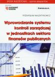 Wprowadzanie systemu kontroli zarządczej w jednostkach sektora finansów publicznych + CD. Autor: Walentynowicz Przemysław. Dadada.pl Okładka książki Wprowadzanie systemu kontroli zarządczej w jednostkach sektora finansów publicznych + CD