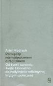 Okładka książki Pomiędzy normatywizmem a realizmem