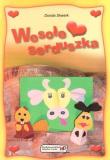 Wesołe serduszka. Wycinanki z sercem. Autor: Dorota Skwark. Dadada.pl Okładka książki Wesołe serduszka. Wycinanki z sercem