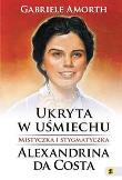 Ukryta w uśmiechu. Autor: Amorth Gabriele. Dadada.pl Okładka książki Ukryta w uśmiechu