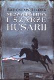 Niezwykłe bitwy i szarże husarii. Autor: Sikora Radosław. Dadada.pl Okładka książki Niezwykłe bitwy i szarże husarii