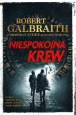 Niespokojna krew. Autor: Galbraith Robert (pseudonim J.K. Rowling). Dadada.pl Okładka książki Niespokojna krew