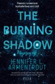 Okładka książki The Burning Shadow. Magiczny pył. Hype wyd. 2023