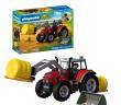 Opakowanie Duży traktor z belami siana